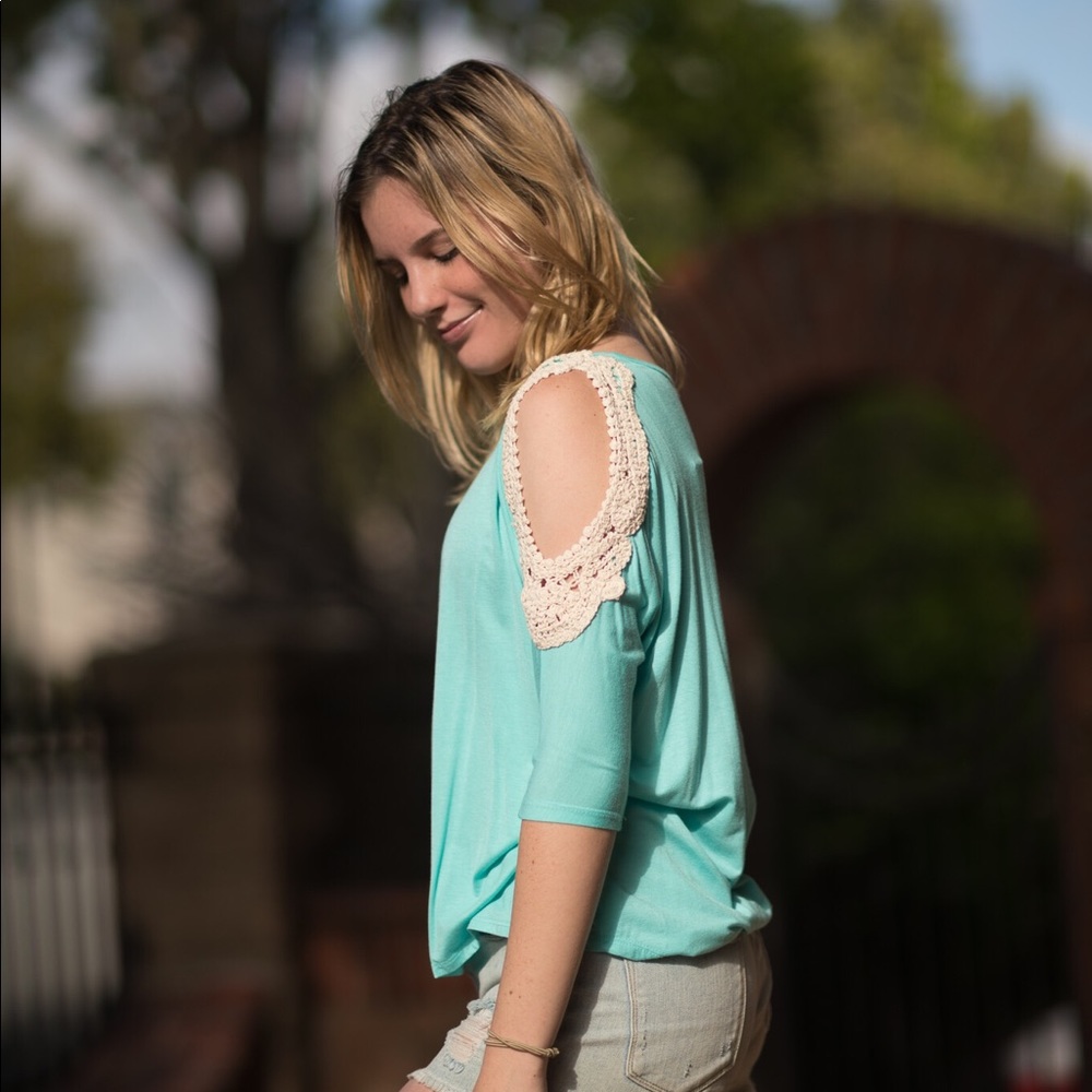 Cold shoulder top woman’s turquoise